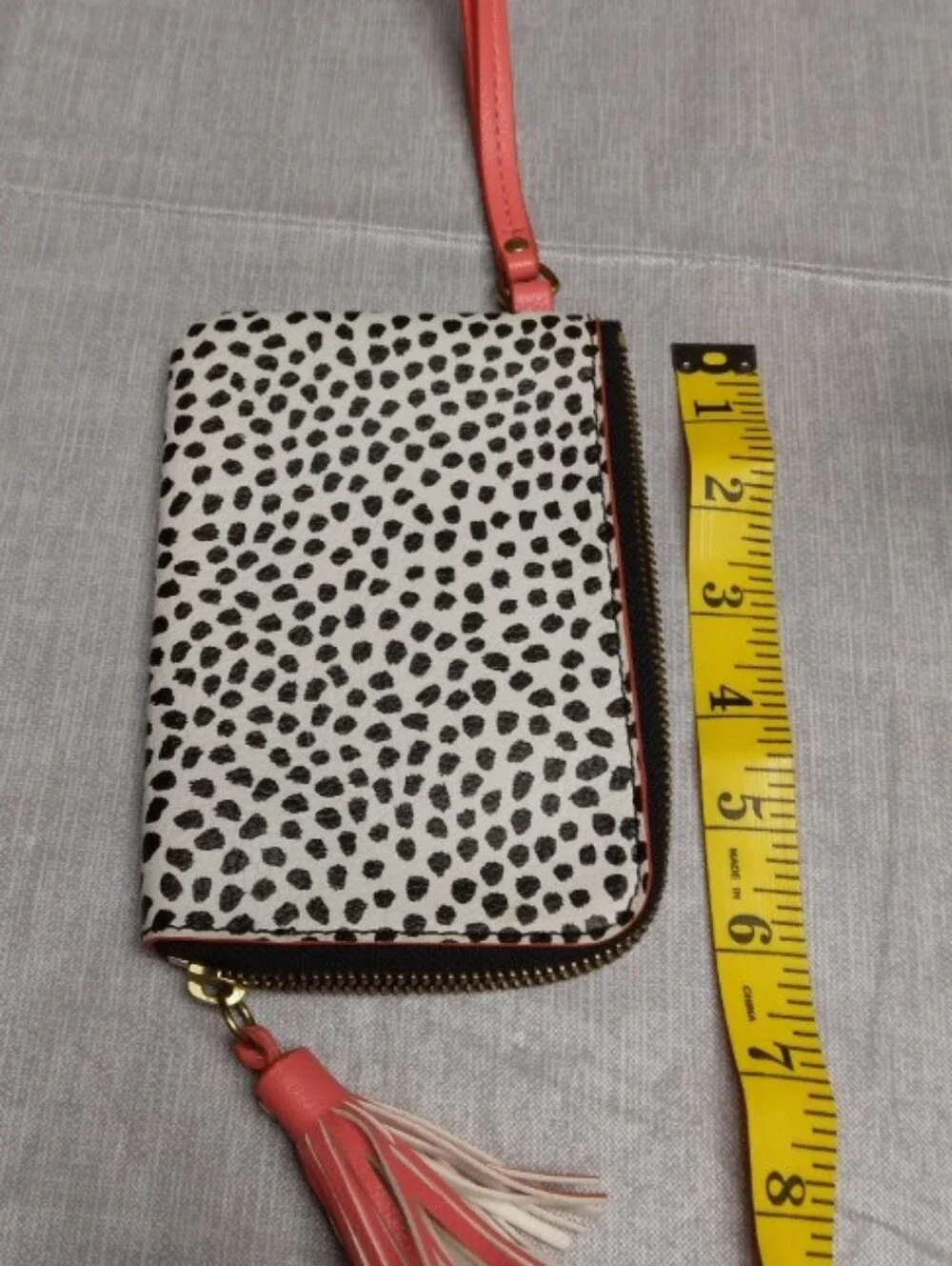 Fossil Black & White Spotted Wristlet with Coral Accents